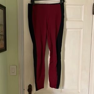 Lysse leggings. Size M. Maroon with wife black stripe on side.